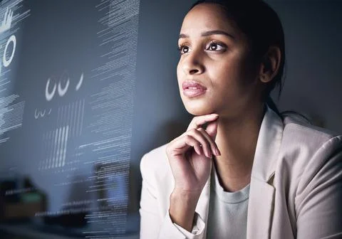 Interpreting data is what I do best. Shot of an attractive young businesswoma 写真素材