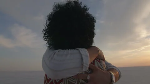 An Interracial couple dancing in barren environment Stock Footage 270081780