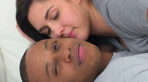 Interracial couple looking at camera Stock-Footage 22706405