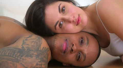 Interracial couple looking at camera Stock-Footage 22706446