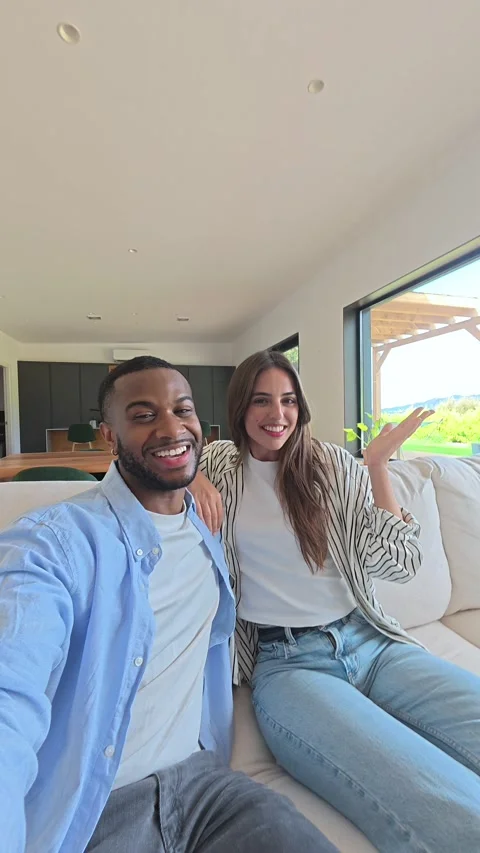Interracial couple making a video call from home Stock-Footage 334636377