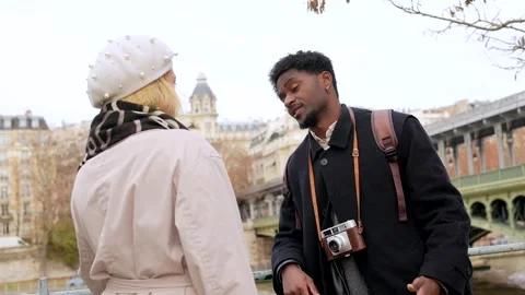 Interracial couple talking and smiling in paris france Stock Footage 327446867