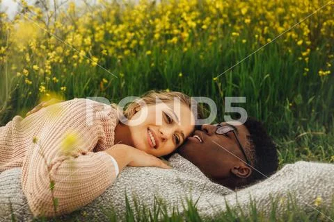 Interracial in romantic moment Stock Photos