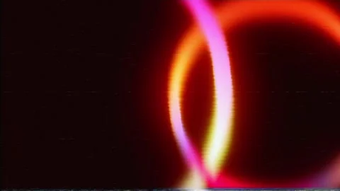 Intersecting Glowing Rainbow Neon Rings with Analog VHS Glitch Stock Footage 340453159