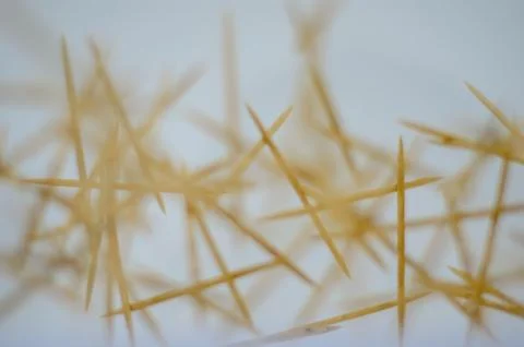 Intersecting toothpicks in soft focus Stock Photos
