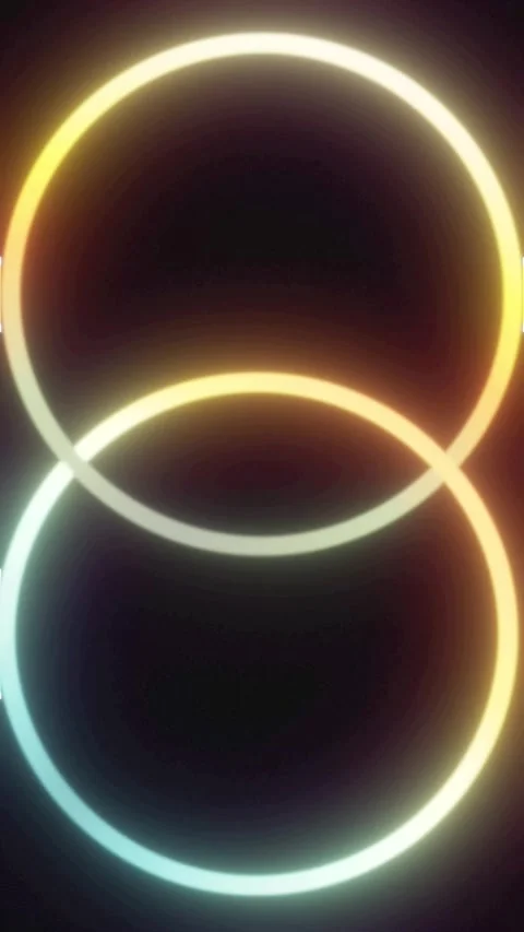 Intersecting Yellow and Cyan Gradient Neon Rings Stock Footage 340454767