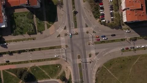 Intersection aerial view showing crosswalks, roads, and urban blocks Stock Footage 336615989