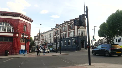 Intersection with bar and undergroundstation in Tufnell Park. London, England. Stock Footage 201478933