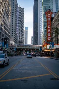 An intersection at the chicago downtown train station, with traffic and tall bui Stock Photos