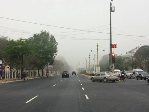 At the intersection fog on the roads Stock Photos