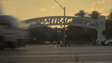 Intersection in front of the Mirage resort in Las Vegas. Cars circulating Stock Footage 113684980