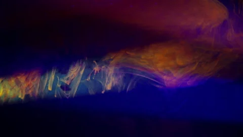 The intersection of light rays in water with paint, abstraction Video stock 141541052