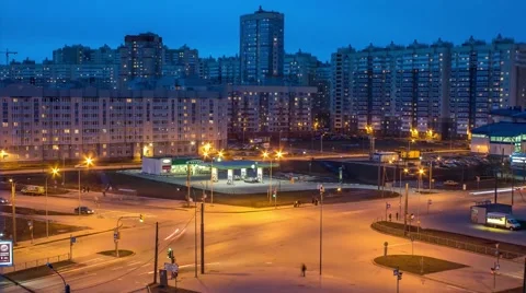 Intersection with lots of cars tonight Stock Footage 63661687