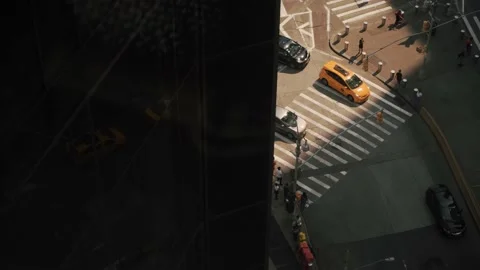 Intersection with pedestrian crossing the streets and vehicle traffic Stock Footage 145022802