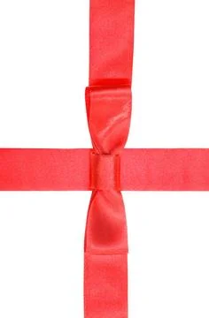 Intersection of red silk ribbon and band with bow intersection of red silk... Fotos de archivo