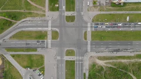 The intersection of roads with passing cars Stock Footage 133433849