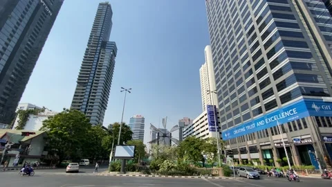 The intersection of Silom and Naradhiwas road 1, Bangkok Thailand Stock Footage 232646197