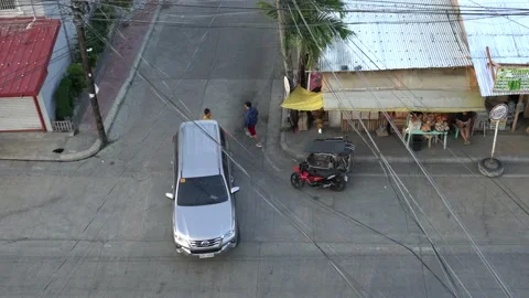 Intersection street traffic in San Jose, Occidental Mindoro Philippines Stock Footage 238670124