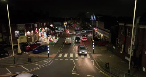 Intersection of of track and traffic moving on surrounding by houses 스톡 동영상 170950148