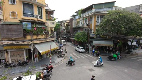 Intersection in a traditional old quarter in the center of Hanoi, Vietnam Stock Footage 157307231