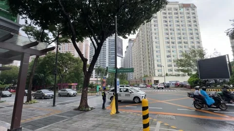 Intersection with Traffic in McKinley Hill on Overcast Day 4k 60fps Video stock 339208311