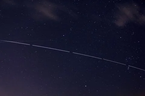 The intersection of the trajectory of the ISS with another object 写真素材
