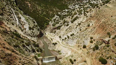 The intersection of two mountains and the river that flows through it. Stock Footage 258230341