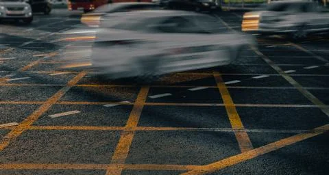 Intersection with yellow markings in the city. Stock Photos