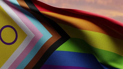 Intersex-inclusive Progress Pride Flag Waving at Sunset Stock Footage 276560831