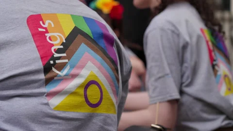 Intersex Progress Pride Flag on King's College T-shirt at London Parade Stockbeeldmateriaal 201051089