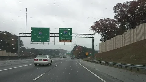 Interstate 285 Atlanta bypass traffic rain blur bokeh effect on ramp exit 67  Stock Footage 149606409