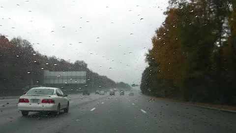 Interstate 285 BLUR Atlanta bypass traffic rain blur merging onto 285 Stock Footage 149606801