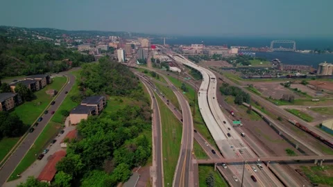 Interstate 35 curving along the hillside toward the Aerial Lift Bridge with Stock Footage 315521469