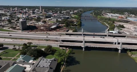 Interstate 35 Highway Bridges over Brazos River and Downtown Aerial Waco Texas Stock Footage 335780472