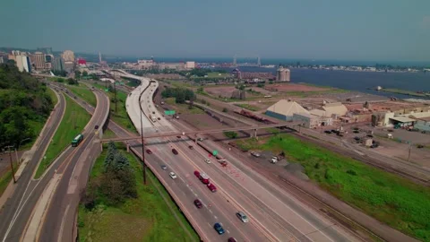 Interstate 35 running along the Duluth waterfront with active traffic, road Stock Footage 315520270