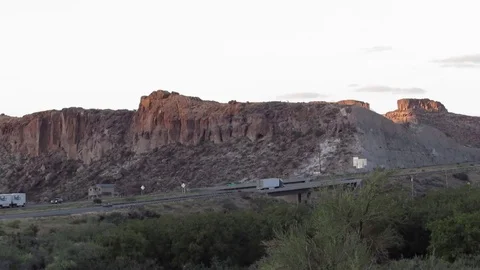 Interstate 40 Traffic through Desert Mountains near Kingman in northern Arizona Stock Footage 80461804