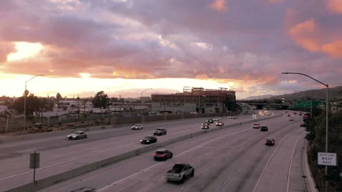 Interstate 5 Freeway, with fast running cars, at sunset Stock Footage 252015347