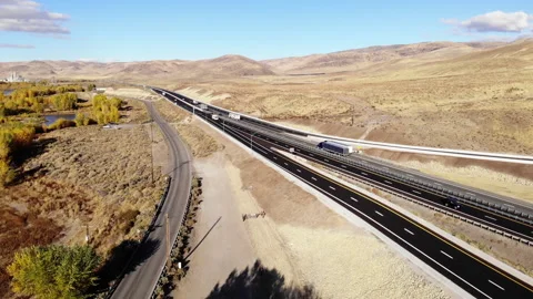 Interstate 80 Outside of Reno Nevada with Trucks on Highway Aerial Stock-Footage 136056563