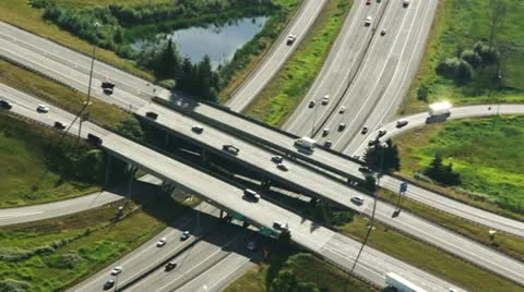 Interstate Bridges Crossing at Large Highway Junction - Aerial Stock Footage