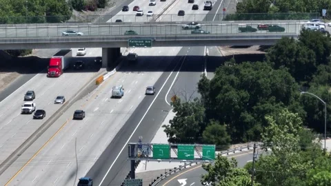 Interstate Freeway and Suburbs Calabasas California Drone Aerial View Stock Footage 250574543
