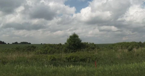 Interstate - Green Fields and Blue Sky - Looking out Window Video stock 90404322