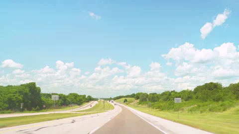 Interstate highway 82, Saint Jo Texas in rural countryside farm road Stock Footage 227184035