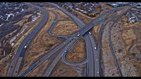 Interstate Highway Interchange Aerial Shot with City in the Background Stock Footage 100134668