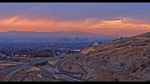 Interstate Highway Interchange Aerial Shot with City in the Background Stock Footage 100136054