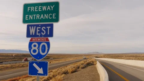 Interstate highway sign in a desert plan... | Stock Video | Pond5