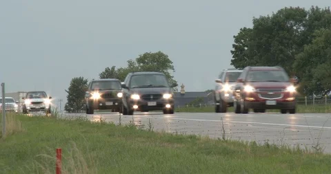 Interstate Highway Traffic - Headlights - Overcast Stock Footage 113409833