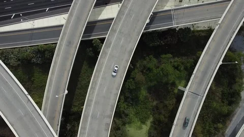 Interstate HorizontalLines Overhead PullBack RAW 2K Stock Footage 260517306