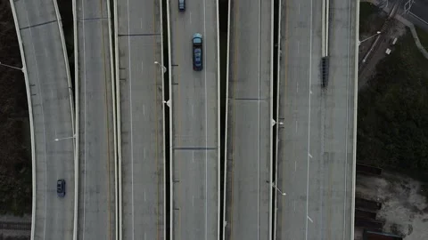 Interstate Overhead Pull Backwards Short RAW 2K Stock Footage 260516922