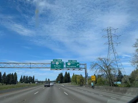 Interstate roadway featuring Eugene and Springfield exit Stock Photos