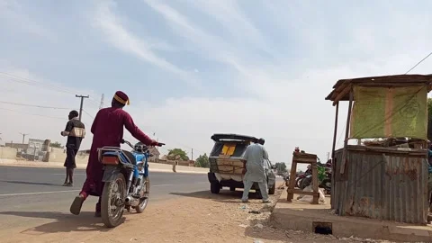 Interstate Taxi Driver Checking Overloaded Boot By Roadside Kano Nigeria Stockbeeldmateriaal 329482565